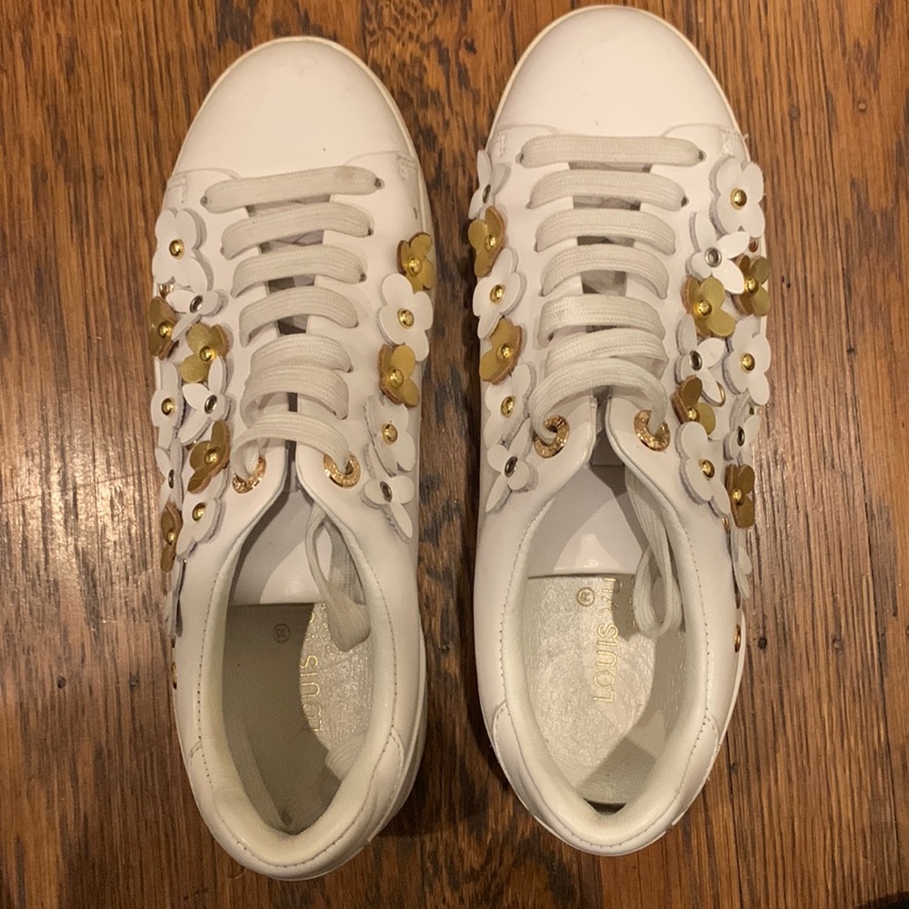 White LV sneakers with white and gold flowers